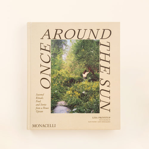 Once Around the Sun by Lisa Przystup, a hardcover book with a cream cover featuring a photograph of a lush green garden.