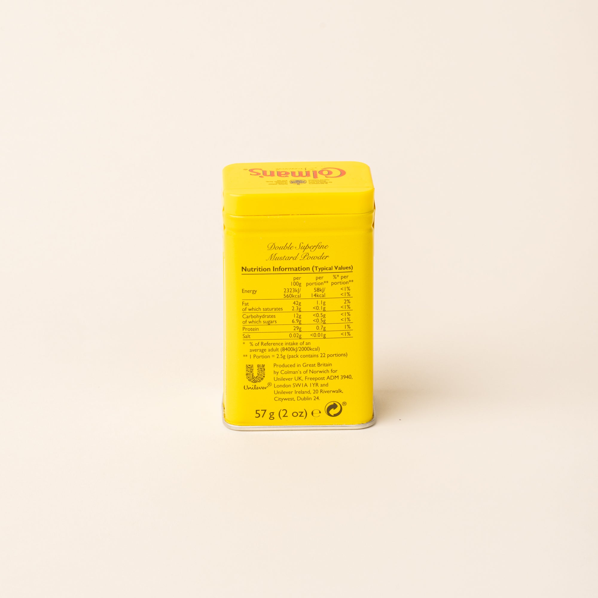 Back of Colman's Mustard Powder tin on a plain white background.