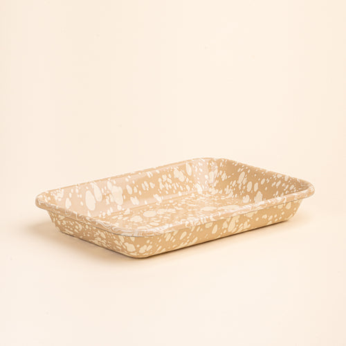 Large rectangular baking dish in a neutral tan color with off-white splattered pattern.