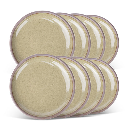 A stack of 8 medium sized ceramic plates in a reflective dappled grey-green color featuring an unglazed rim.