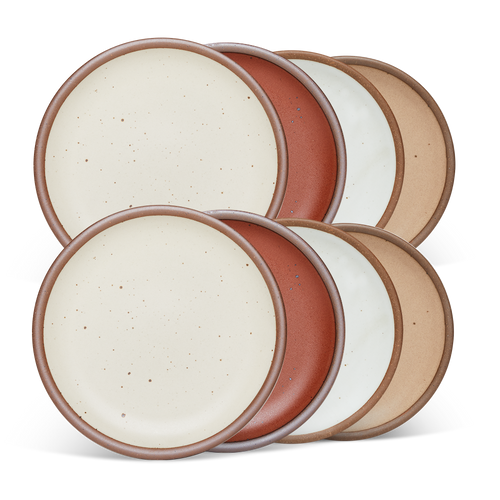 8 medium sized ceramic plates in a cool white, warm pale brown, warm off-white, and cool terracotta colors featuring iron speckles and an unglazed rim.