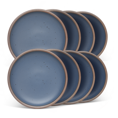 8 medium sized ceramic plates in a cool, medium blue color featuring iron speckles and an unglazed rim.